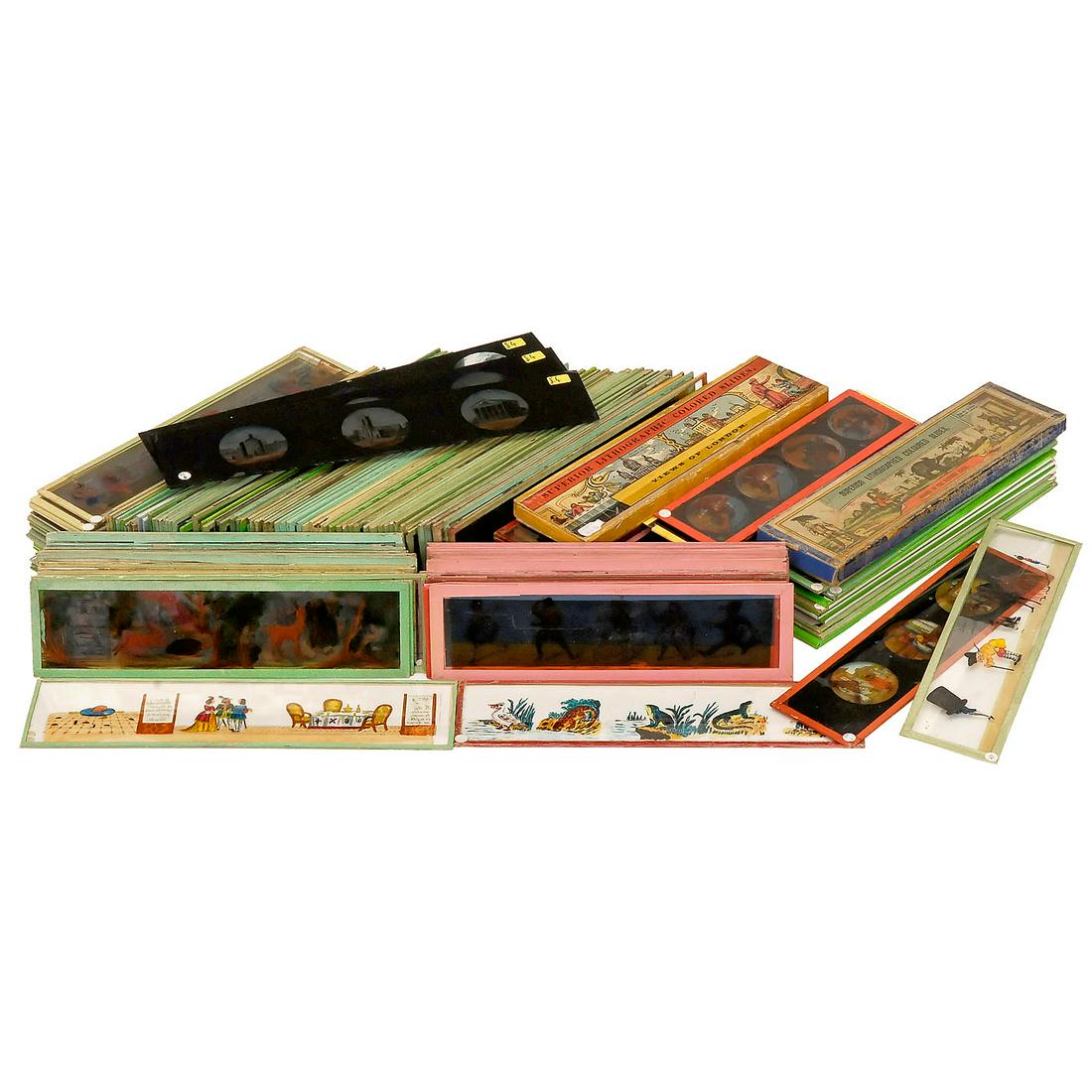 Approx. 205 Magic Lantern Strip Slides (Height 2 1/3: Approx. 205 Magic Lantern Strip Slides (Height 2 1/3 in.) Glass slides with length of 7 4/5 in. to 10 5/8 in., from various countries and with different motifs (comics, caricatures, fairy tales, anima
