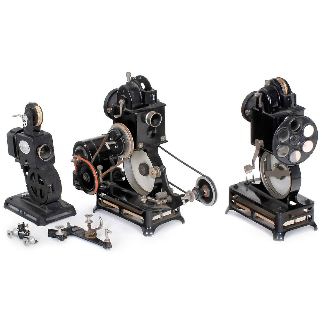 3 Movie Projectors for 9,5mm Film, c. 1924: 3 Movie Projectors for 9,5mm Film, c. 1924 Pathé, Paris. 1) Pathé Baby with long film system and motor (not working). - 2) Pathé Baby with filter disc for color effects (working). - And: 3) Pathé