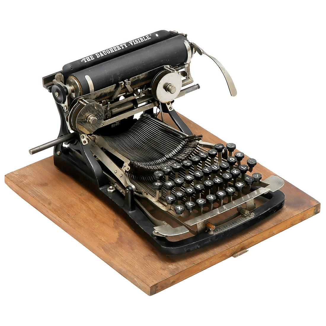 The Daugherty Visible, 1891: The Daugherty Visible, 1891 Very interesting American typebar design with accurate visible writing. Completely interchangeable typebar and keyboard system, manufactured by The Daugherty Typewriter Com