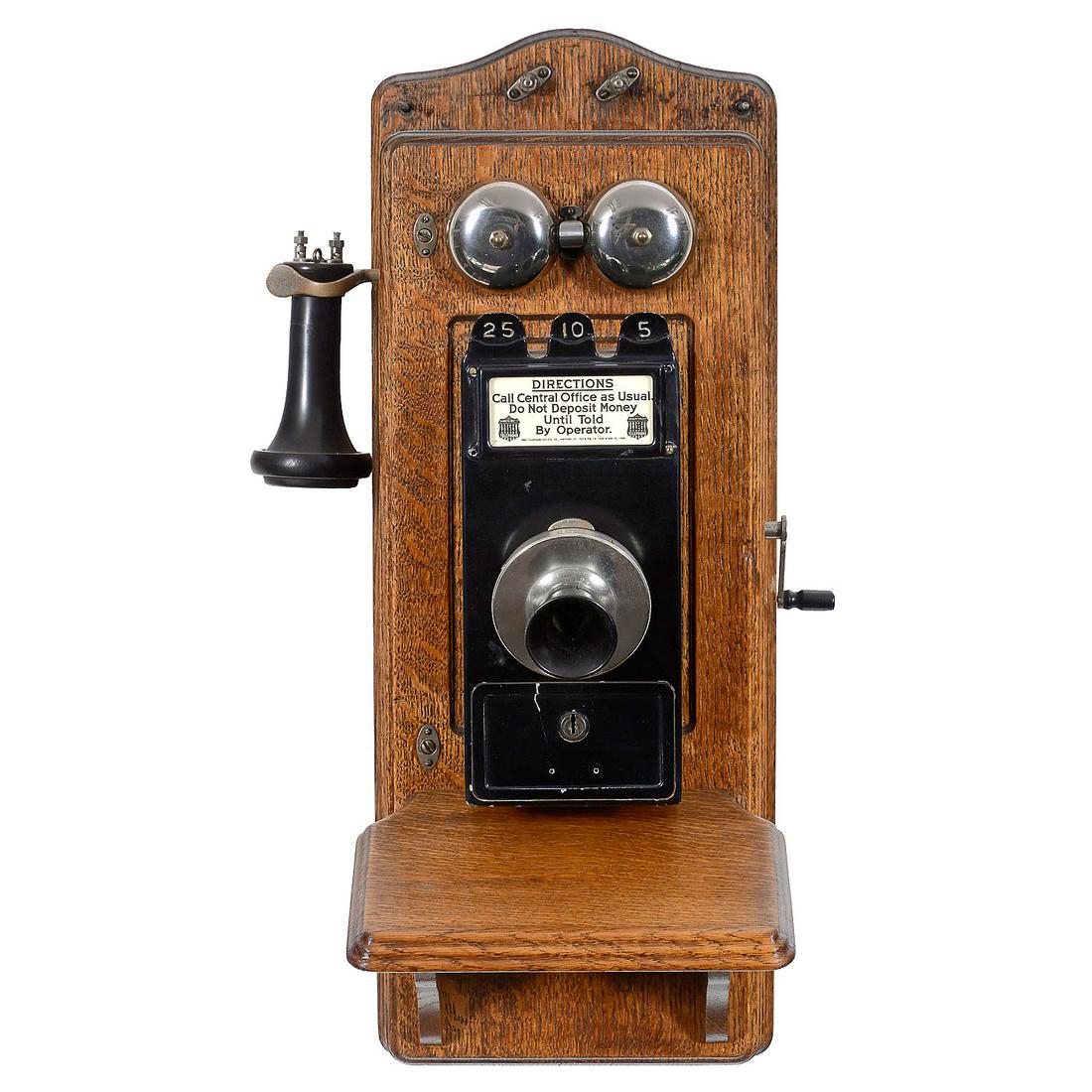 Gray Telephone Pay Station, c. 1910: Gray Telephone Pay Station, c. 1910 Model 18, 3 coin slots, post-pay machine, lacquered metal station with coin drawer, moveable speaking horn, Bell-type earphone, crank-driven 5-part induction coil, 
