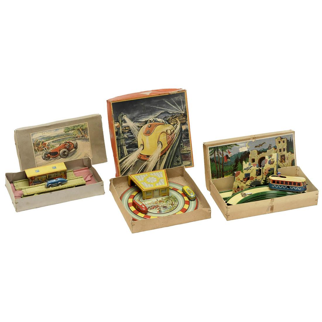3 Early Technofix Tracks, c. 1950: 3 Early Technofix Tracks, c. 1950 Gebrüder Einfalt, Nürnberg. Lithographed tin, original boxes. 1) Twin Track, no. 263. - 2) Witch Train, no. 246. - And: 3) Motorway with filling station, no. 245. 3