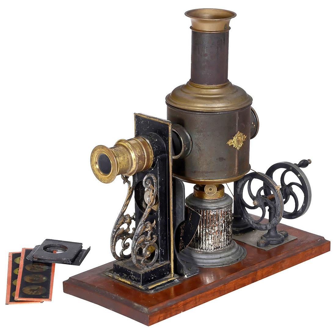 Kinematador No. 790 by Ernst Plank, 1897: Kinematador No. 790 by Ernst Plank, 1897 One of the most attractive magic lantern projectors for round discs in rotating holder as moving pictures. Made by Ernst Plank, Nuremberg. With hand-cranked d
