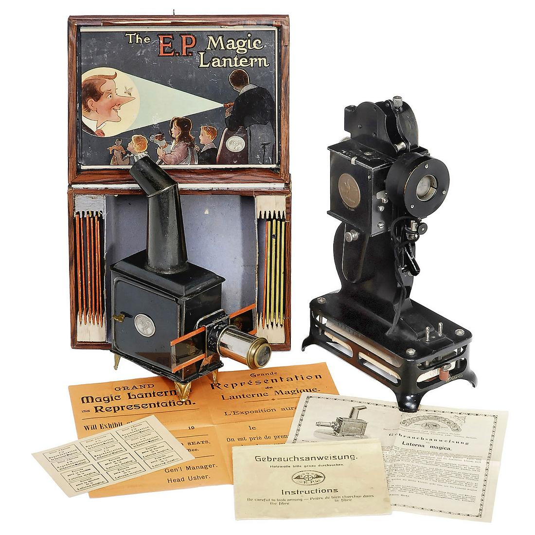 Magic Lantern and Pathex Projector: Magic Lantern and Pathex Projector 1) Ernst Plank, Nuremberg. Magic lantern, height approx. 11 in., for 35mm strips, with mirror, lamp, 12 strips and rarely found instructions in several languages, p