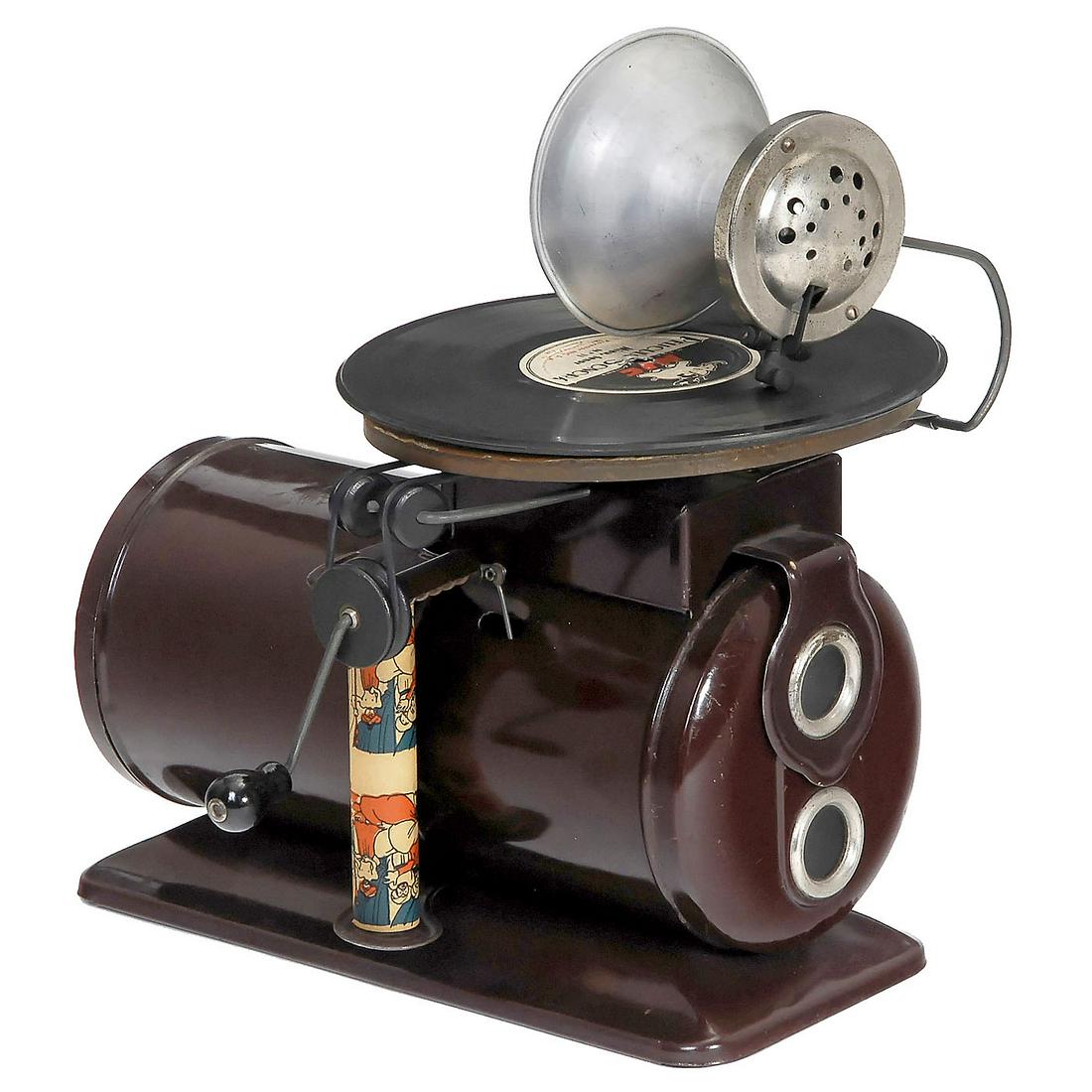 NIC Toy Gramophone and Projector, c. 1935: NIC Toy Gramophone and Projector, c. 1935 Spain, metal case, handcrank-driven (working), electric functions not tested, with one disc and one film strip. Spielzeug-Grammophon und -Projektor NIC, um
