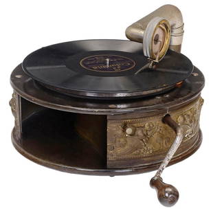 "Elmo Selectaphon" German Table-Top Gramophone, c. 1925: "Elmo Selectaphon" German Table-Top Gramophone, c. 1925 No. 1831, round mahogany-stained wood case, embossed brass decoration with fruits and cornucopias, Klingsor mica reproducer, spring-driven (work