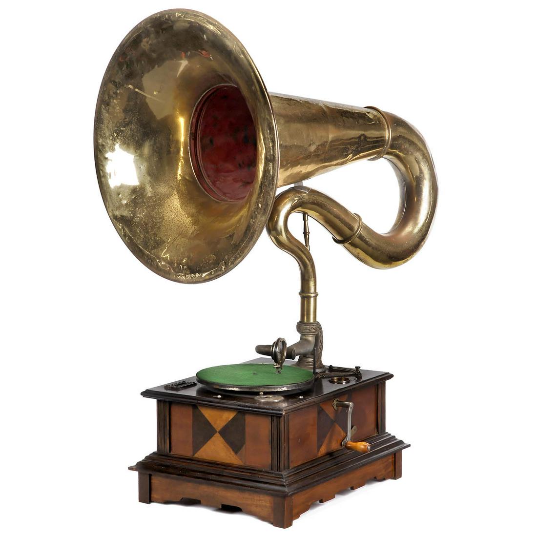 Parlophon Coin-Operated Gramophone with Extra-Large: Parlophon Coin-Operated Gramophone with Extra-Large Brass Horn, c. 1915 Karl Lindström, Berlin. Wood case with geometrical inlays, coin drawer, mica reproducer, gooseneck brass horn, Ø 21 7/8 in.,