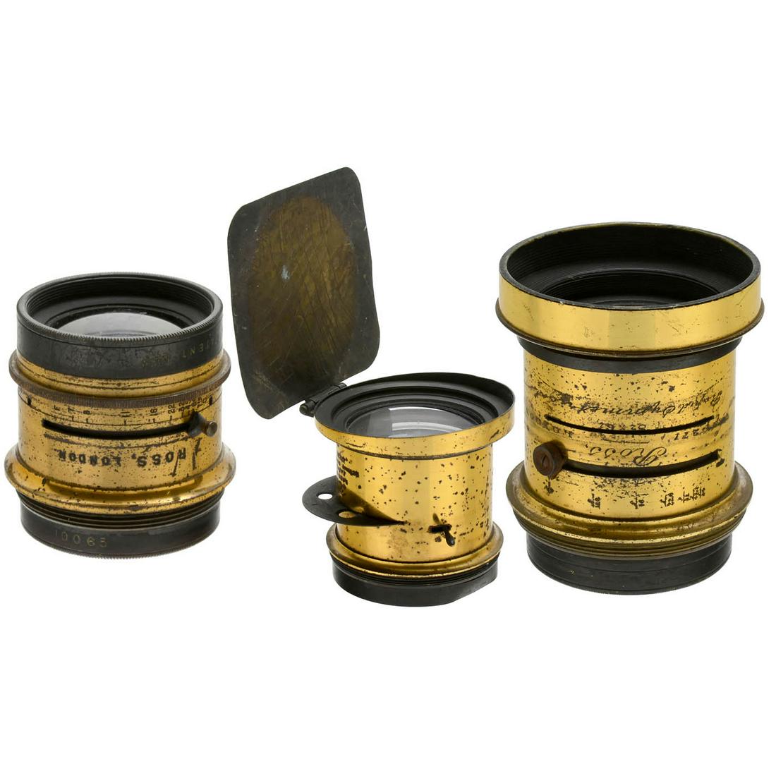 3 Lenses by Ross, London: '3 Lenses by Ross, London 1) Rapid Symmetrical, no. 40271, approx. 30 cm focal length, iris stop and for waterhouse stop, height 3 1/6 in., Ø 2 1/3 in. (3+/3+) - 2) Th. Ross Actinic Doublet, no. 1250