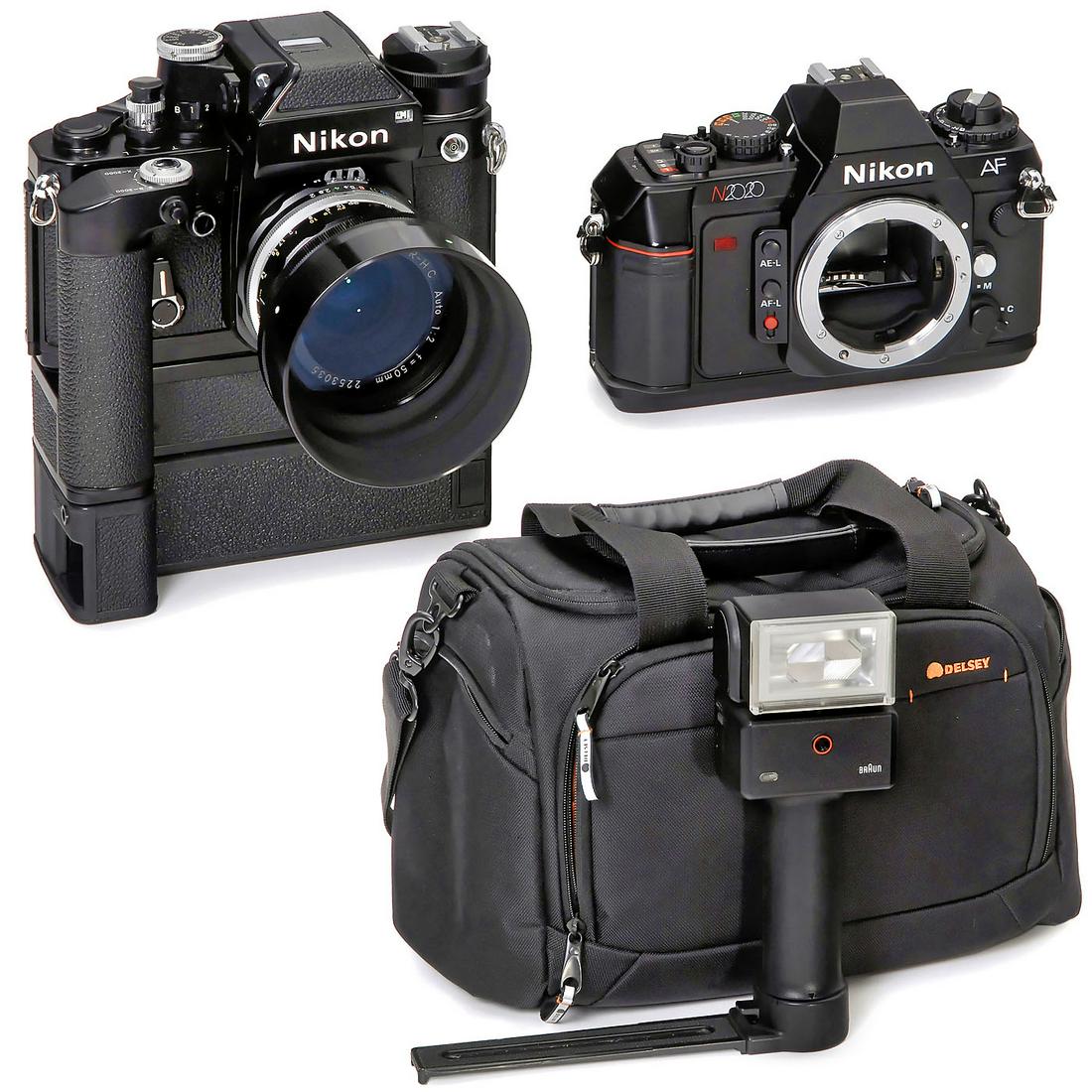 Nikon F2 Outfit: Nikon F2 Outfit Nikon, Japan. 1) Nikon F2, no. 7352914, with DP-1, exposure meter working, in near-mint condition, never used. (2-2-/2-) - With cap, case and flash-shoe AS-1. - 2) Nikkor-H C 2/50 mm n