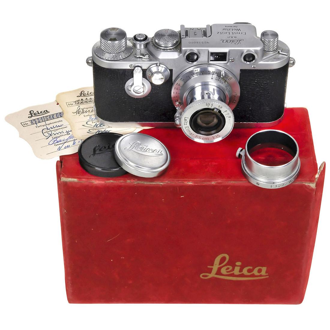 Leica IIIc upgraded to IIIf, c. 1950: Leica IIIc upgraded to IIIf, c. 1950 Leitz, Wetzlar. No. 518000, black-dial synchronization, with Elmar 3,5/5 cm lens no. 772900 from same production year as the camera, FISON sunshade, Leitz cable-re