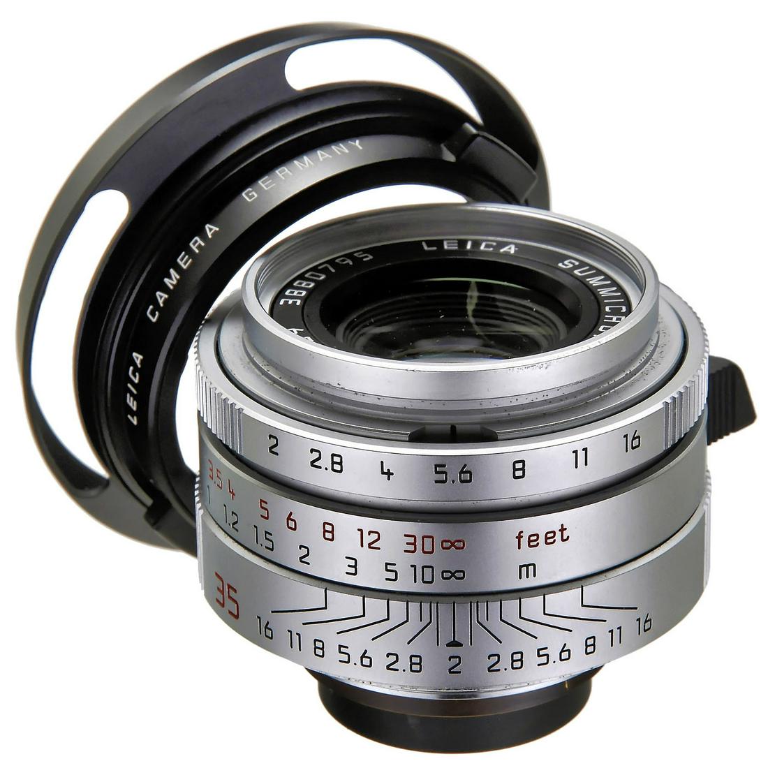 Summicron 2/35 Asph. M39, 2000: Summicron 2/35 Asph. M39, 2000 Leica, Solms. No. 3880795, silver-chrome finish, special edition with screw-mount M39. With soft-leather case, rear cap, lens hood 12504, papers and box. Very good condi