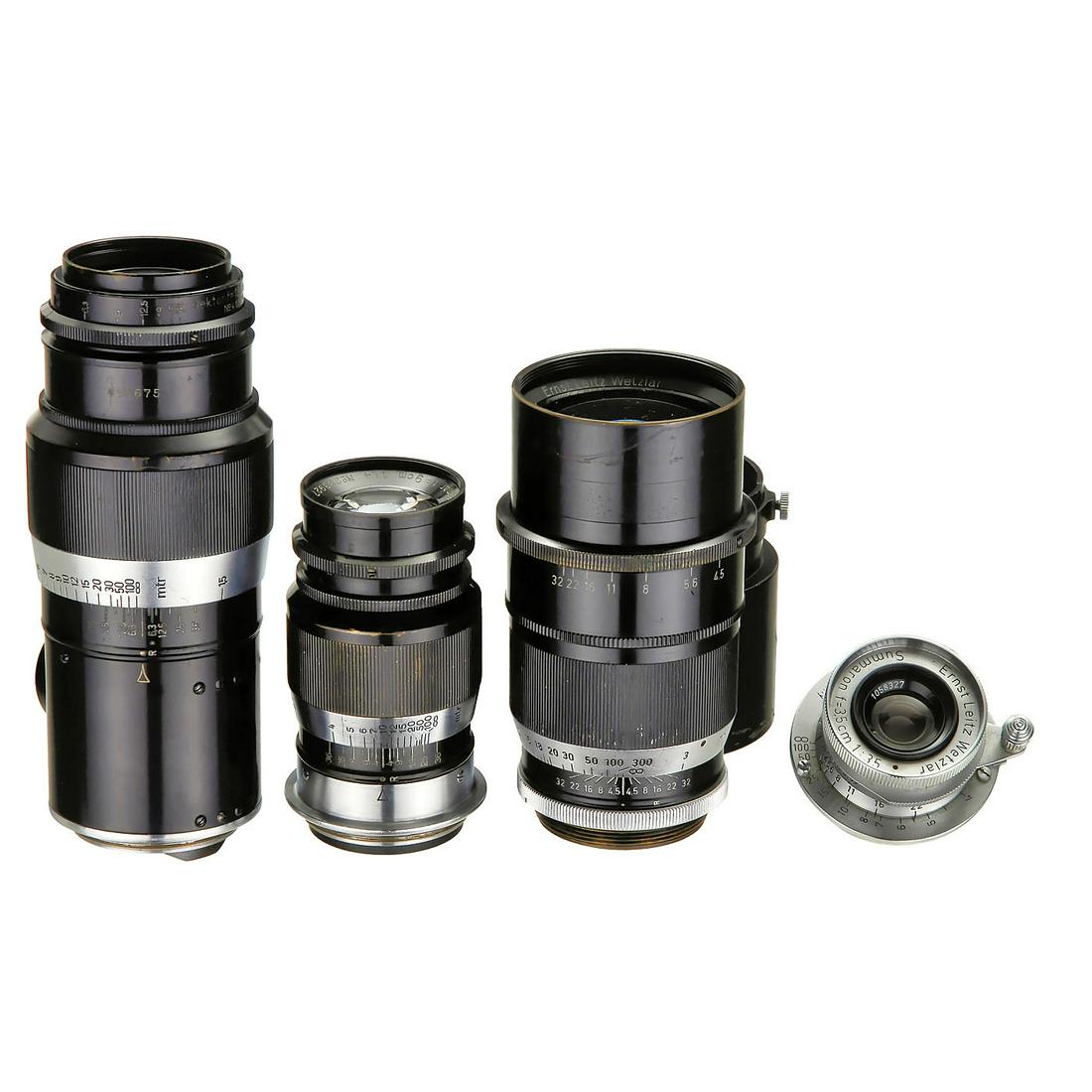4 Leica Screw-Mount Lenses: 4 Leica Screw-Mount Lenses Leitz, Wetzlar. 1) Summaron 3,5/3,5 cm no. 1058327, feet scale, c. 1953, light dust inside, with caps. (2-/3) - 2) Elmar 4/9 cm no. 283927, c. 1935. Aperture scale up to 36,