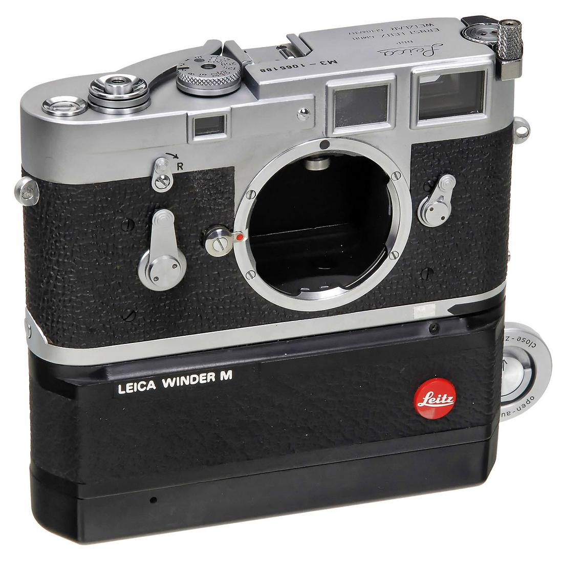 Leica M3 with Motor Coupling, c. 1962: Leica M3 with Motor Coupling, c. 1962 Leitz, Wetzlar. No. 1065188 (from production numbers of Leitz Canada), unusual M3 with post-production built-in coupling, similar in function to the Leica M type 