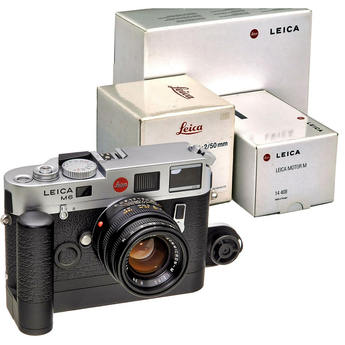 Leica M6 (0.85) with Summicron-M 2/50 mm and Motor M,: Leica M6 (0.85) with Summicron-M 2/50 mm and Motor M, c. 2000 Leica AG, Solms. 1) Leica M6 TTL (0.85), no. 2593224. With box, camera box, instructions, papers and strap. Top-end camera in top conditio