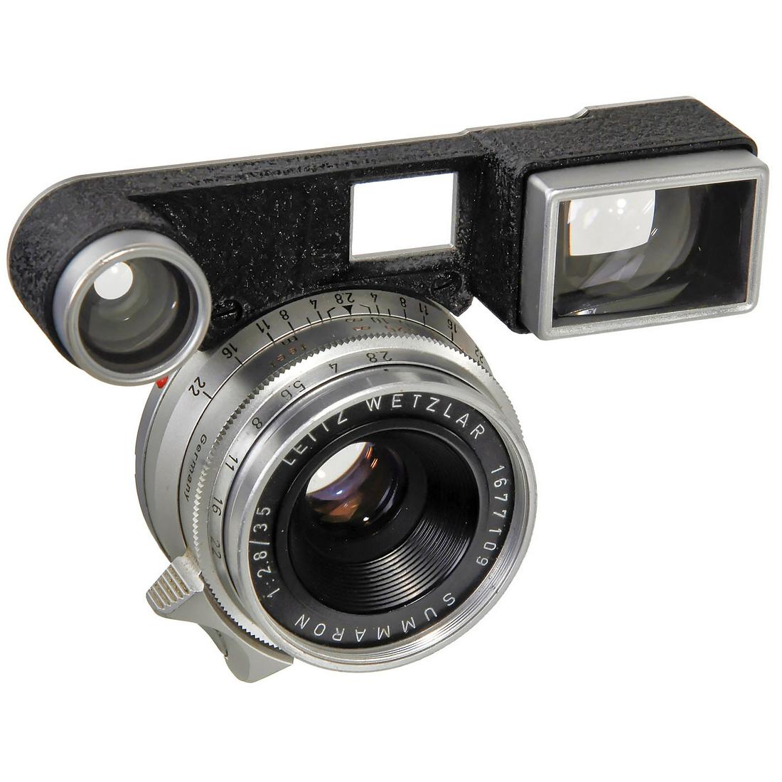 Summaron 2,8/35 mm for Leica M3, c. 1960: Summaron 2,8/35 mm for Leica M3, c. 1960 Leitz, Wetzlar. No. 1677109 with fixed spectacle viewfinder for Leica M3. With both caps. Summaron 2,8/35 mm für Leica M3, um 1960 Leitz, Wetzlar. Nr. 1677109