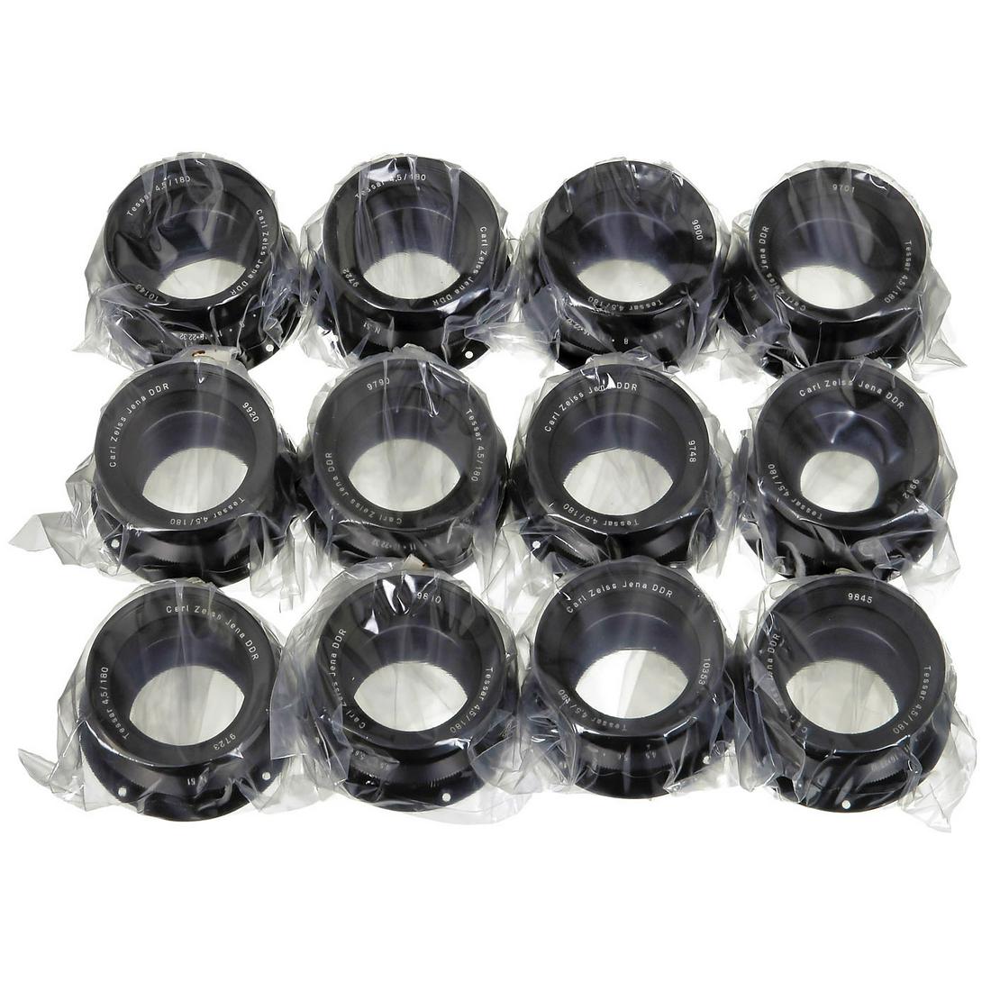 12 x Zeiss Jena Tessar 4,5/180 mm, c. 1991: 12 x Zeiss Jena Tessar 4,5/180 mm, c. 1991 Zeiss, Jena. All in unopened foil. Angle of view 55 degrees, size of picture diameter 220 mm, filter size 58, weight 390 g, with ring. With copy of data shee