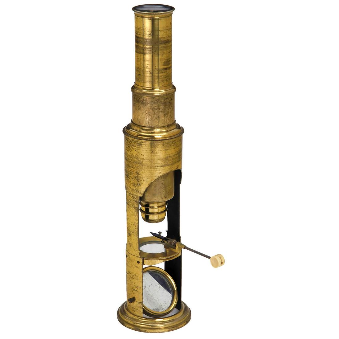 Martin-Type Drum Microscope, c. 1860: Martin-Type Drum Microscope, c. 1860 Marked on label in lid "Thompson Optician, Nottingham", original lacquered brass, concave mirror, drawtube, 1 eyepiece, 2 objectives, 1 live cell, forceps and 3 bo