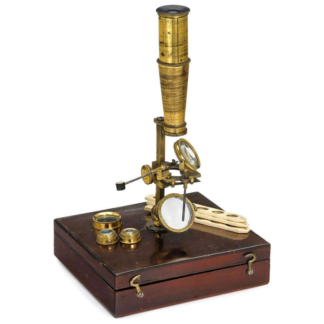 Gould-Type Travel Microscope by William Cary, c. 1825: Gould-Type Travel Microscope by William Cary, c. 1825 Engraved on pillar "Cary, London", original lacquered brass, rack-and-pinion focusing to the stage, plug-in mirror and stage, 1 eyepiece, 3 object