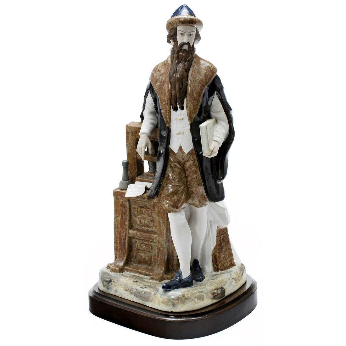 Porcelain Sculpture of the Inventor of Printing: Porcelain Sculpture of the Inventor of Printing Johannes Gutenberg by "Rex Porcelain Manufacturing" Spain, c. 1975. Produced in a limited edition of 100 only, the figure depicts the father of printing