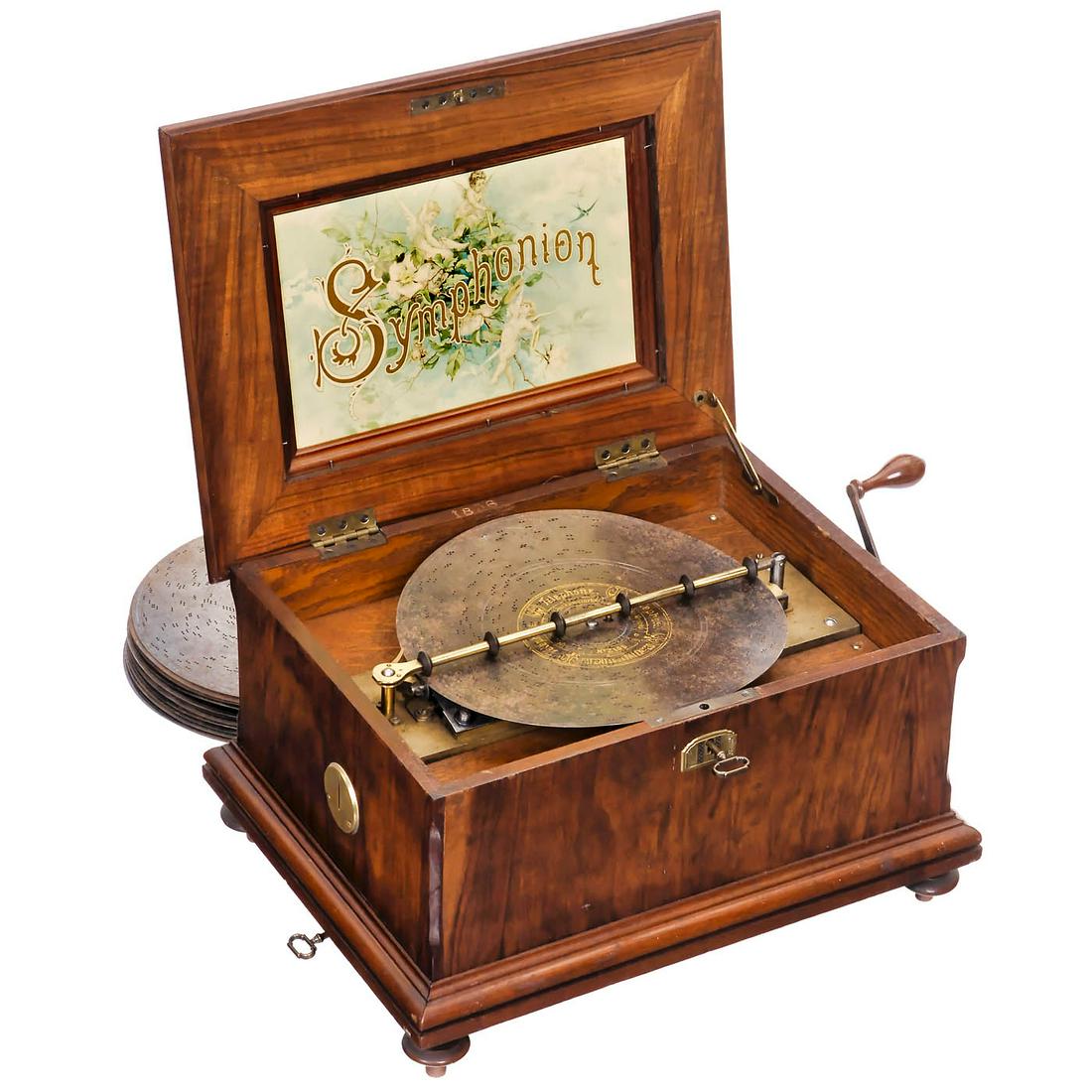 Symphonion "Lipsia" Coin-Activated Musical Box, c. 1900: Symphonion "Lipsia" Coin-Activated Musical Box, c. 1900 By Symphonion Musikwerke, Leipzig. For discs of Ø 10 ? in., 84 teeth in 2 music combs (complete), coin-slot on left side, walnut case with "Sym