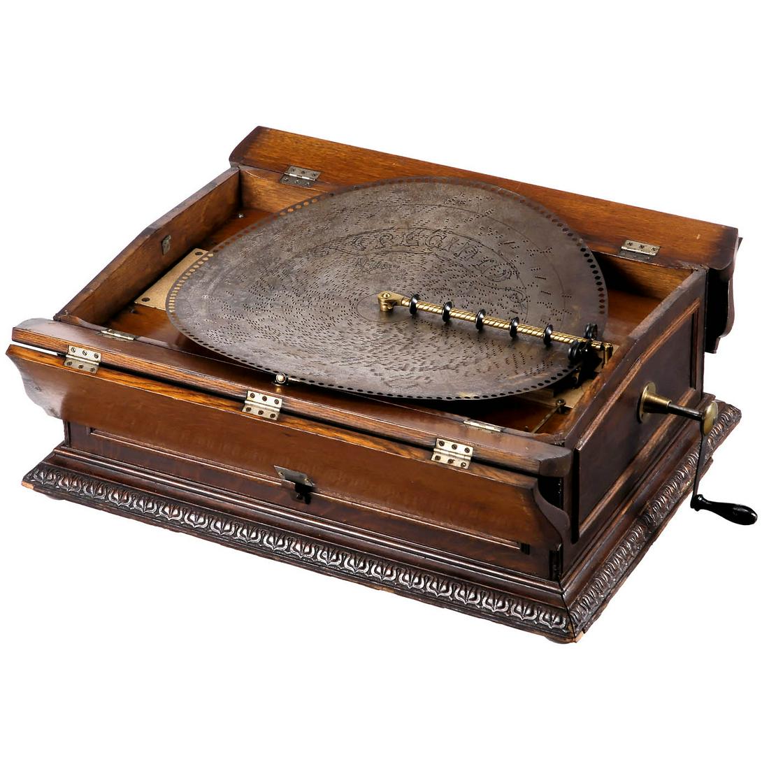 Regina No. 26 Folding-Top Disc Musical Box c. 1902: Regina No. 26 Folding-Top Disc Musical Box c. 1902 Regina Music Box Company, New Jersey. No. 29054, for 20 ¾ in. discs, with 130 teeth in duplex comb (complete), oak case with four-piece folding-top 