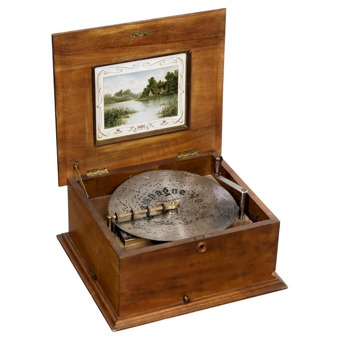 Polyphon Style 42N Disc Musical Box, c. 1900: Polyphon Style 42N Disc Musical Box, c. 1900 Polyphon Musikwerke, Leipzig. For discs of Ø 11 ¼ in., 54 teeth in steel comb (complete), walnut-veneered case (missing one leg), original inner lid lith