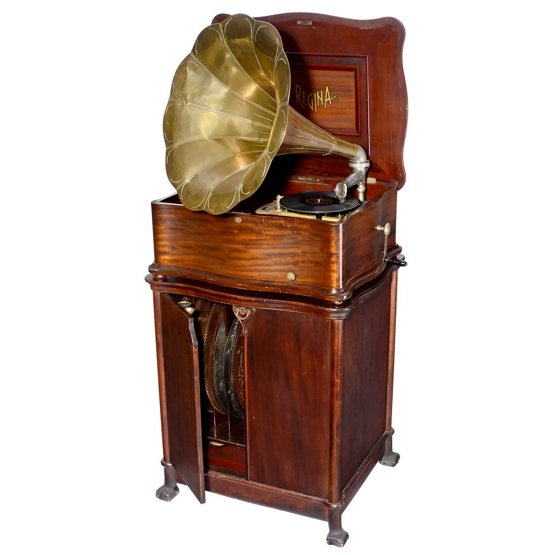Reginaphone Model 139 with Base Cabinet: Reginaphone Model 139 with Base Cabinet Regina Music Box Company, Rahway, New Jersey. A rare combination of disc musical box and phonograph for 20 3/4 in. metal discs, 130 teeth in double comb (comple