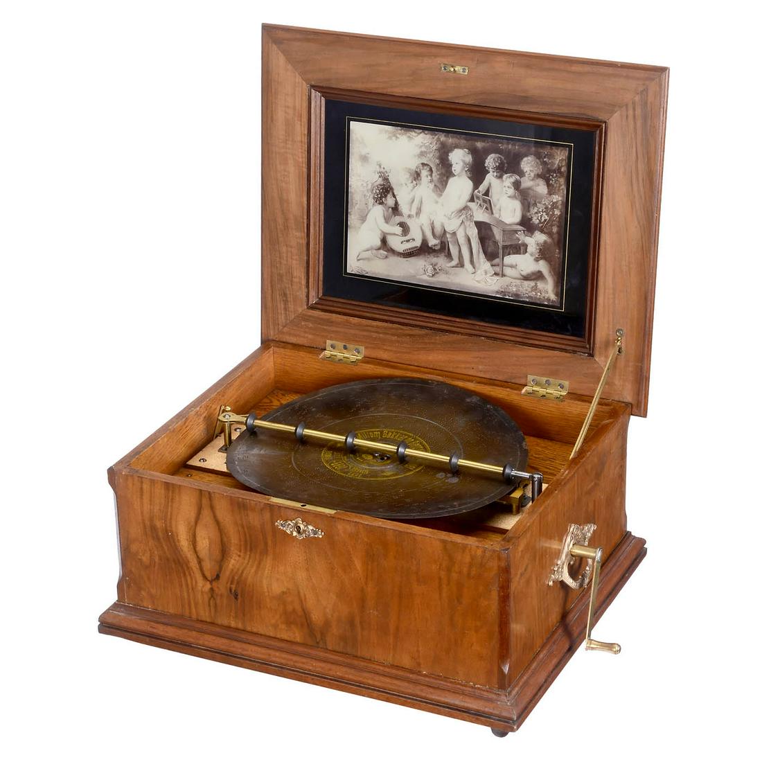 Symphonion No. 30 Disc Musical Box, c. 1900: Symphonion No. 30 Disc Musical Box, c. 1900 No. 265089, Symphonion Musikwerke, Leipzig. For discs of 13 5/8 in., 100 teeth in 4 music combs (complete), sublime-harmony arrangement, crank-wound, walnut