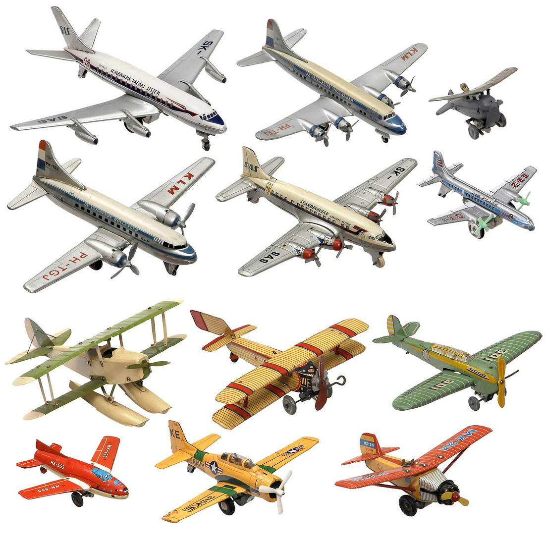 12 Tin Toy Airplanes, c. 1955-65 (1 of 3)