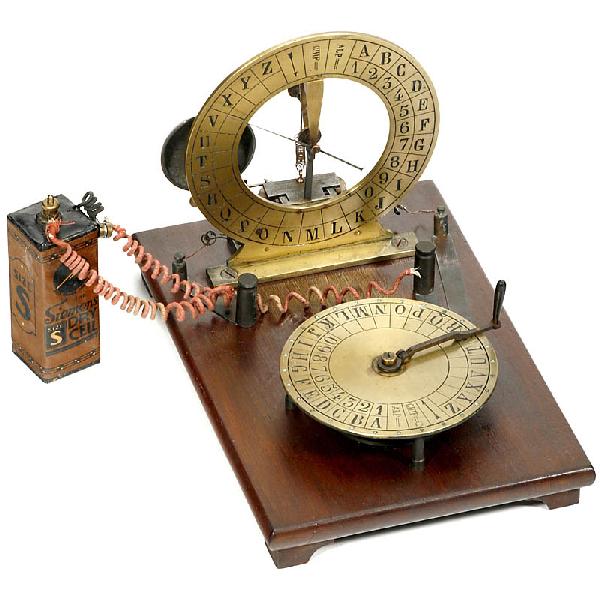Breguet-Style Dial Telegraph, c. 1900: Breguet-Style Dial Telegraph, c. 1900 Unmarked demonstration model, transmitter and receiver, lacquered brass dials, on mahogany socket, size: 7 x 10 1/2 x 7 in., with 1 Siemens dry cell. Deutsche Bes