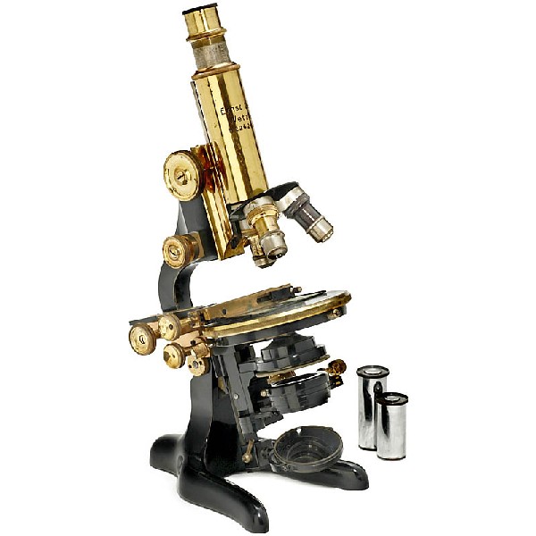 Brass Microscope "Ernst Leitz, Wetzlar": Brass Microscope "Ernst Leitz, Wetzlar" Engraved. Horseshoe base, originally lacquered, triple nosepiece, large crosstable, diaphragm, extendable tube, height: 12 1/2 in., with box. Deutsche Beschreib