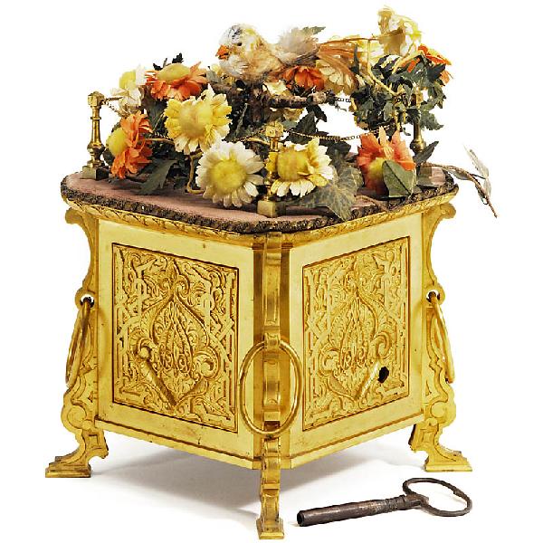 Large Singing-Bird Automaton, c. 1900: Large Singing-Bird Automaton, c. 1900 Heavy cast bronze base containing the spring motor and the mechanism, the bird opens its beak simultaneously to its twitter, bird covered with real feathers, anti