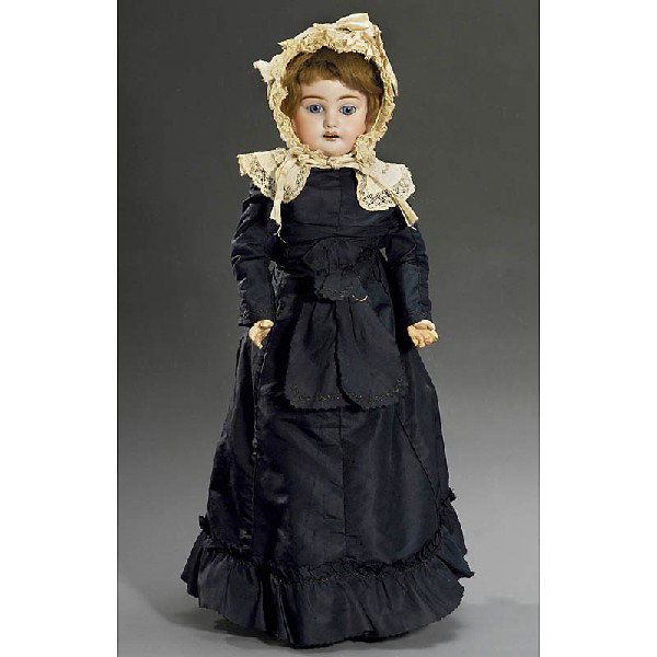 Rare Bisque Doll by Carl Knoll, Bohemia, 1896 onwa: Rare Bisque Doll by Carl Knoll, Bohemia, 1896 onwards With socket head impressed "KC 4", fixed light blue glass eyes, open mouth with porcelain teeth, original mohair wig, well-preserved jointed compo