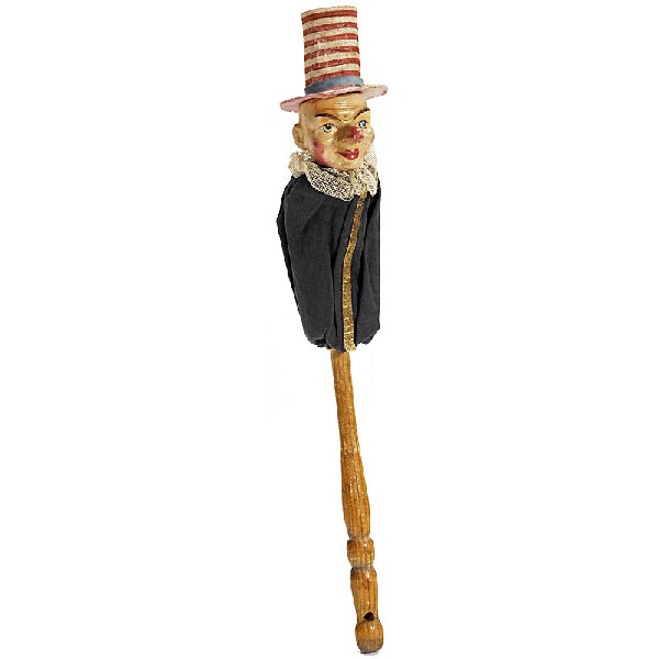 Squeaking American Stick Doll, c. 1910: Squeaking American Stick Doll, c. 1910 Composition head, hat in national colors, bellows under the clothes, height: 12 1/2 in, works very well! Deutsche Beschreibung: Amerikanische Schleuderpuppe, um