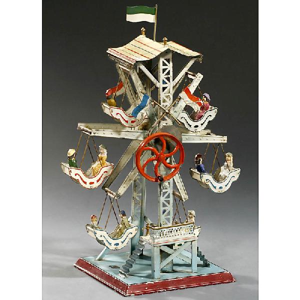 Ferris Wheel "Doll" No. 729, c. 1930: Ferris Wheel "Doll" No. 729, c. 1930 Manufactured by: "Doll & Cie.", Nuremberg, hand-painted tin, figures made of composition material (1 missing), driven by handcrank or steam engine, height: 15 3/4 