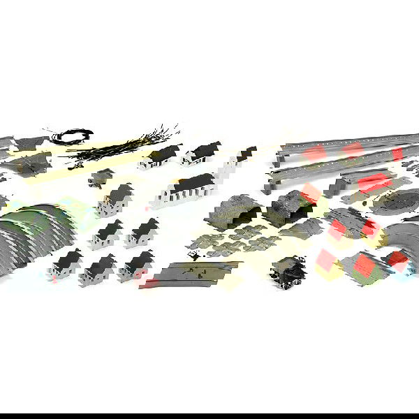 Complete Traffic Layout "Schuco Varianto", 1955: Complete Traffic Layout "Schuco Varianto", 1955 Varianto-Lasto no. 3042V with trailer, 2 tunnels no. 3010/31, wires, bridges and switches. - And: Miniature houses. Deutsche Beschreibung: Komplette Anl
