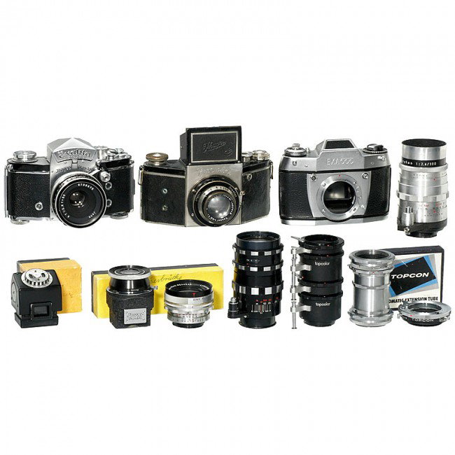 3 Exakta Cameras, Lenses and Accessories: 3 Exakta Cameras, Lenses and Accessories Ihagee, Dresden. 1) Exakta B, 4th version, 1935, no. 477971, 4 x 6,5 cm, Tessar 2,8/7,5 cm, no. 1452412, not working. (3-/5) - 2) Exakta Varex IIa, 2nd version
