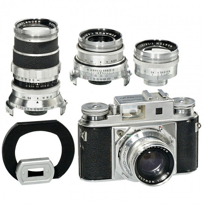 Voigtländer Prominent II Outfit, 1959: Voigtländer Prominent II Outfit, 1959 Voigtländer, Braunschweig. 1) Prominent II, no. B 74805, with body cap. - 2) Ultron 2/50 mm. - 3) Nokton 1,5/50 mm. - 4) Dynaron 4,5/100 mm. - 5) Super-Dynaron
