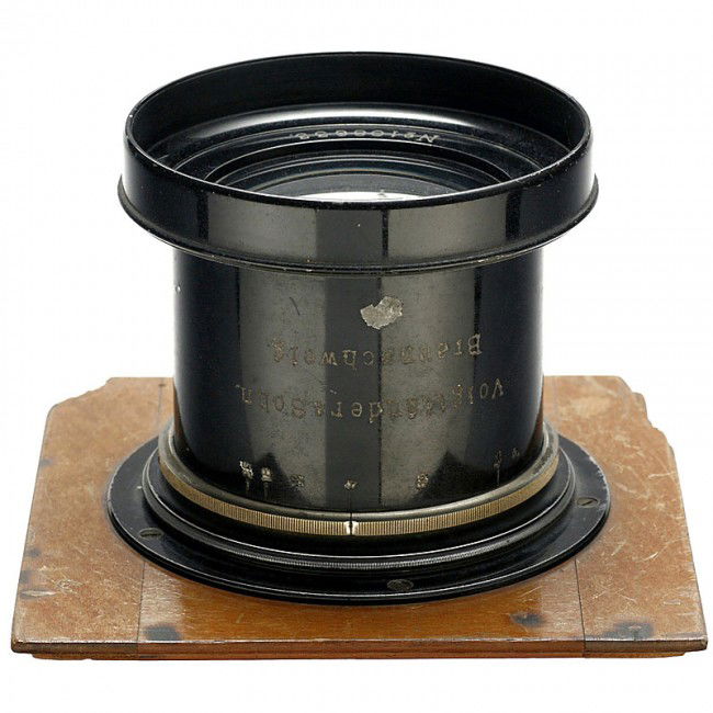 Heliar 4,5/36 cm, 1910: Heliar 4,5/36 cm, 1910 Voigtländer & Sohn, Braunschweig. No. 108633, aperture 4,5-25, with screw-on ring on 6 3/4 x 6 3/4 in. lens board. Heliar 4,5/36 cm, 1910 Voigtländer & Sohn, Braunschweig. Nr.