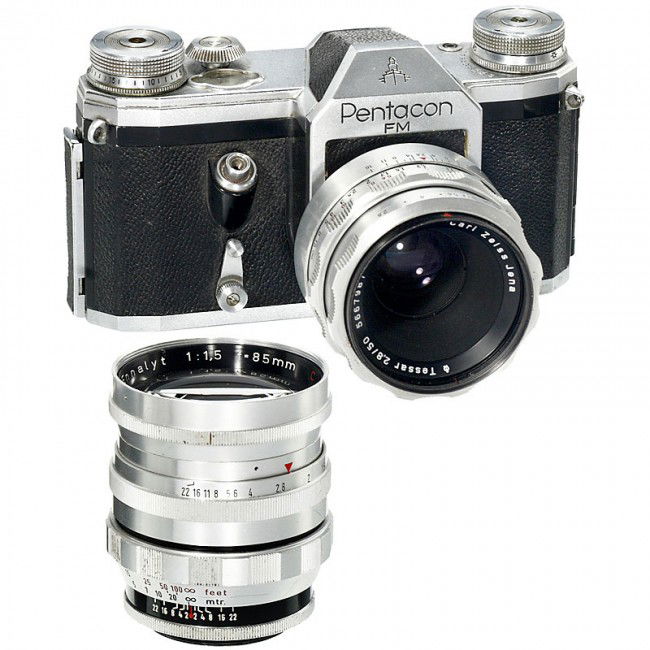 Ennalyt 1,5/85 mm M42: Ennalyt 1,5/85 mm M42 1) Enna, Munich. Ennalyt 1,5/85 mm BV M42, coated. (2-3/2-3). - 2) Zeiss. Tessar 2,8/50 mm, automatic diaphragm, no. 5667987. (3/3-) - Add-on: Pentacon FM, long shutter speeds un