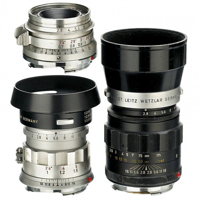 3 Lenses Leica M: 3 Lenses Leica M Leitz, Wetzlar and Canada. 1) Summaron 2,8/35 mm, no. 1921633, with both lens caps. (3-/3) - 2) Summicron 2/50 mm, no. 2159435, chrome, dual focusing scale, with lens hood 12585. (3/3