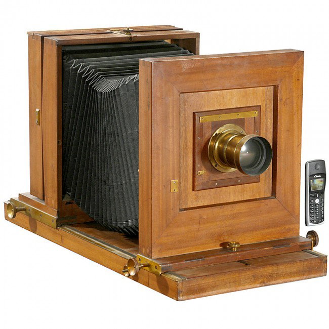 Studio Camera 24 x 30 cm, c. 1900: Studio Camera 24 x 30 cm, c. 1900 Presumably Mazo, Paris. Tropical wood with brass fittings, extendable ground plate, brass lens by E. Mazo Opticien "8x10", iris stop, focusing screen back. Studiokame
