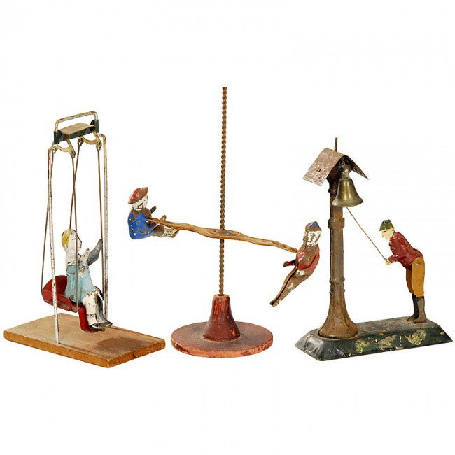 Fernand Martin: “The Wild Bell Ringer“ and Further: Fernand Martin: “The Wild Bell Ringer“ and Further Tin Toys Hand-painted tin. 1) 1) 1) “Le Sonneur Endiablé“, early French tin toy, c.1885, height 6 in., very rare. - 2) 2) Girl on Swing, USA