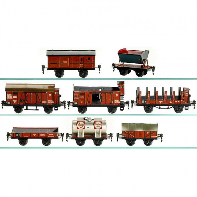8 Railway Trucks "Märklin" (Gauge 0), c. 1935: 8 Railway Trucks "Märklin" (Gauge 0), c. 1935 Tank wagon "Standard/Esso" no. 1674; luggage wagon no. 1722; 2 x closed goods wagon no. 1791 (1 without roof); cement wagon no. 1681; stake wagon no. 177