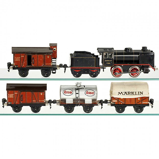 Steam Locomotive with 4 Railway Trucks "Märklin",: Steam Locomotive with 4 Railway Trucks "Märklin", Gauge 0 Tender locomotive no. R 880, clockwork (working); tank wagon "Esso" no. 1674; closed goods wagon with brake box no. 1619; closed goods wagon