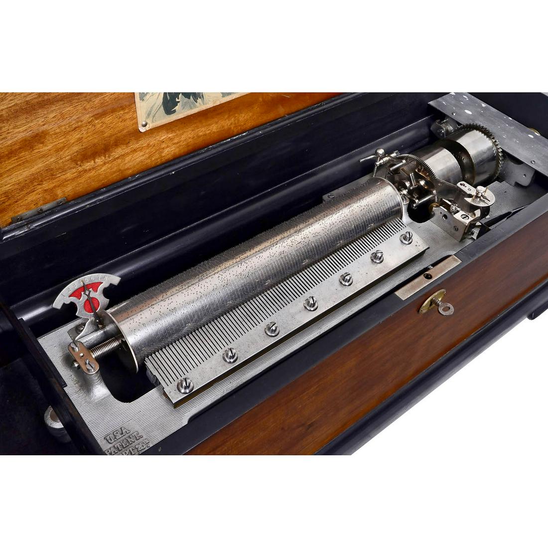Coin-Activated Cylinder Musical Box, c. 1900: Coin-Activated Cylinder Musical Box, c. 1900 No. 110365, possibly by Alfred Junod, playing eight popular airs, with 94 teeth in comb (complete), nickel-plated movement, ratchet-wind coaxial double-spr