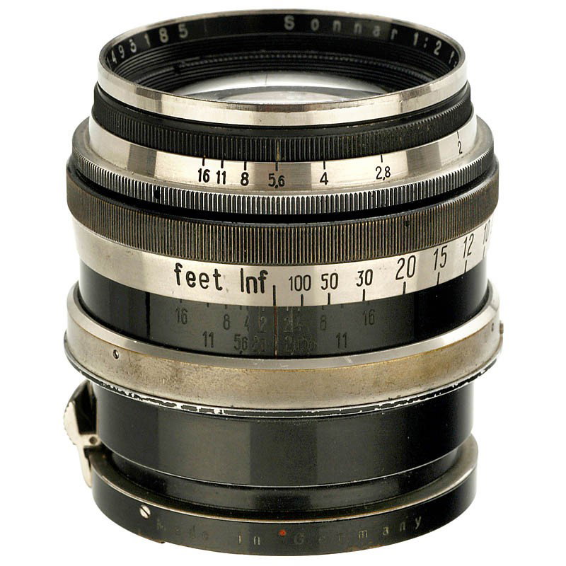 Sonnar 2/8,5 cm for Contax, 1933: Sonnar 2/8,5 cm for Contax, 1933 Carl Zeiss, Jena. For Contax I, black/nickel, feet, no. 1493185, glass with spotted coating, front cap. - Sought-after early Contax lens. Sonnar 2/8,5 cm für Contax, 