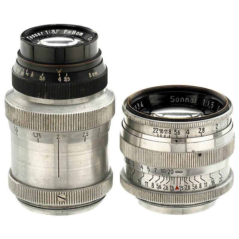Zeiss Lenses for Screw-Mount Leica: Zeiss Lenses for Screw-Mount Leica Carl Zeiss, Jena. 1) Sonnar 1,5/5 cm T, no. 2869334, 1946, M39, chrome mount, RF-coupled. - And: 2) Tessar 3,5/8 cm, no. 2668627, 1939, M39, aluminum mount, RF-coupl