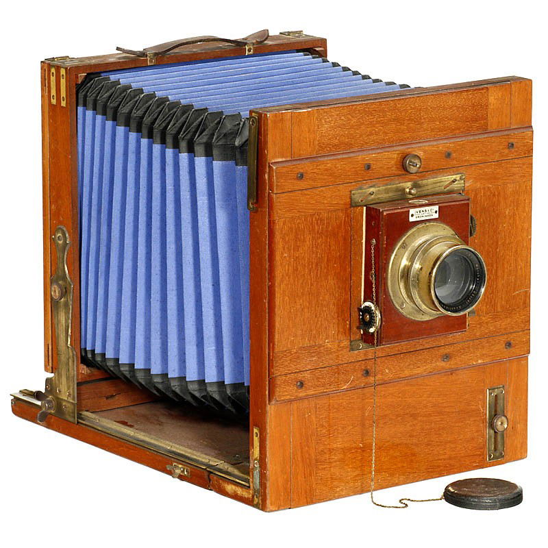 German Field Camera, c. 1890: German Field Camera, c. 1890 Unmarked, size 18 x 24 cm, tropical wood with brass fittings, blue bellows, brass lens G. Leitmeyer Doppel-Anastigmat 5,4/24 cm, focal plane shutter (not working), focusin