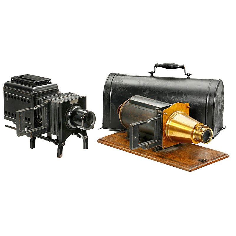 2 Slide Projectors for 3,2 x 4 in. Slides: 2 Slide Projectors for 3,2 x 4 in. Slides Both with slide carriers. The black one by Bausch & Lomb, 10 in. high and with no illuminant, in good condition. The other is 7,5 in high and electrified. Wit