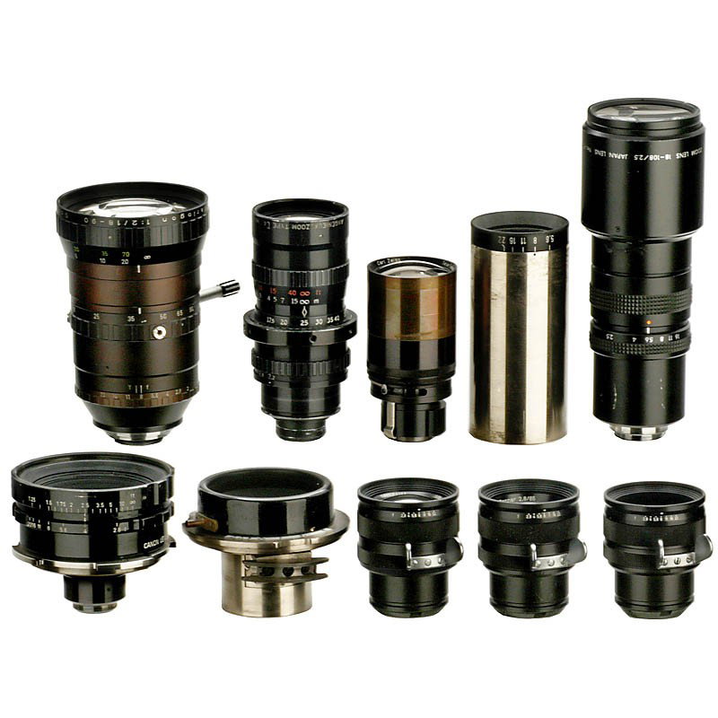 10 Movie Camera Lenses, c. 1960: 10 Movie Camera Lenses, c. 1960 1) Arriflex-Standard-mount: "Carl Zeiss", Sonnar 1:2,8/85 mm, Distagon 1:2,8/32 mm and Distagon 1:2,9/28 mm (nearly new). (1-2/-) - 2) Probably Mitchel-mount: Canon K35